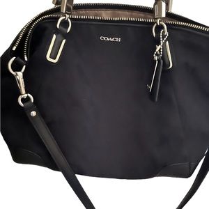 Black signature coach handbag with shoulder strap